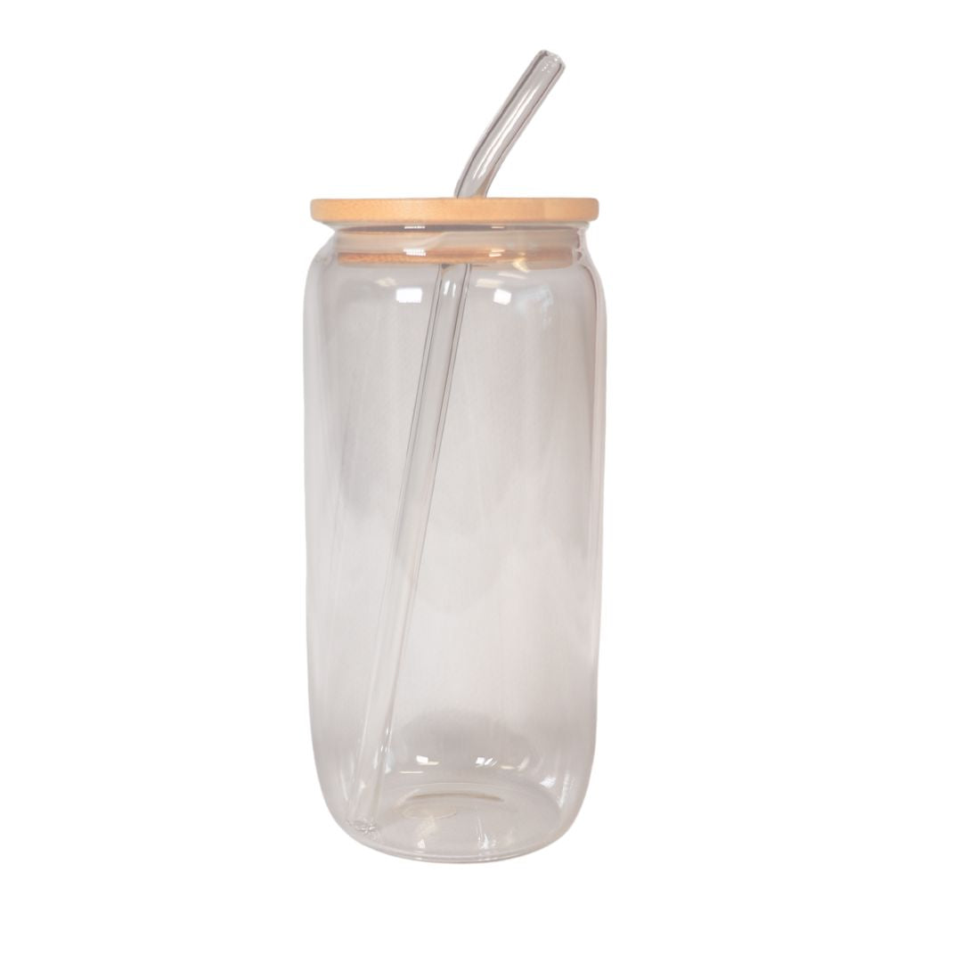 Clear glass tumbler with a wooden lid and glass straw on a white background